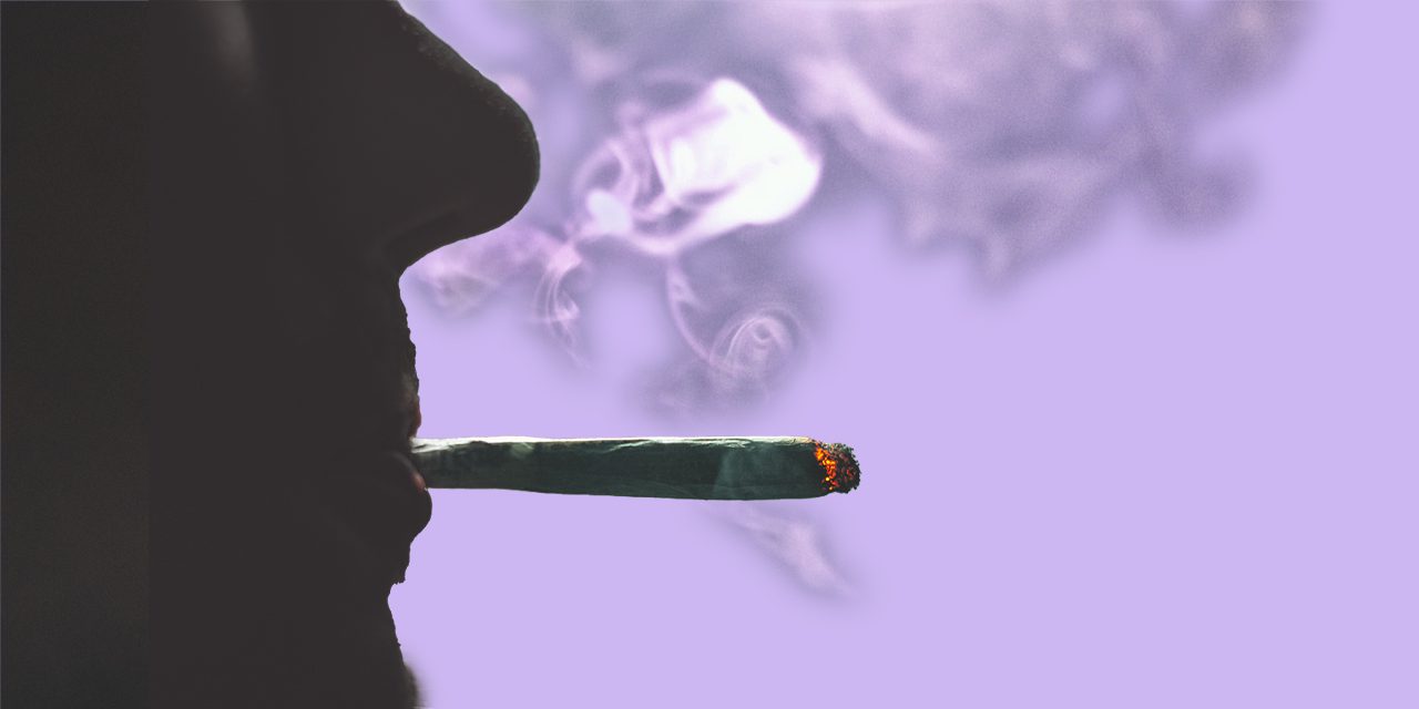closeup of man's mouth smoking with visible smokes in purple background