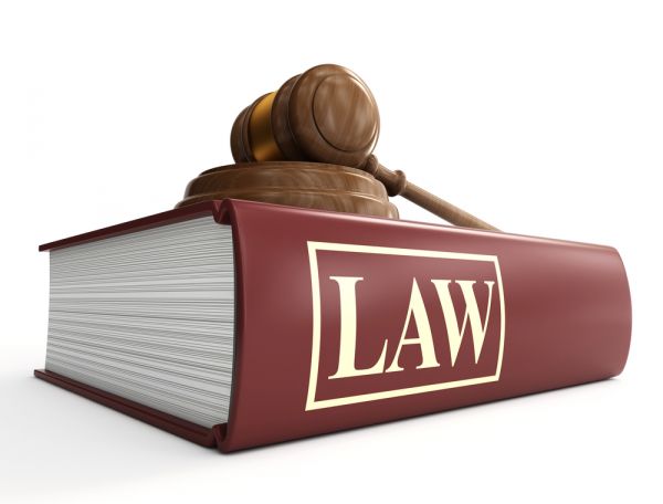 Law; justice; law book; gavel; sound block; mallet; hammer; book.