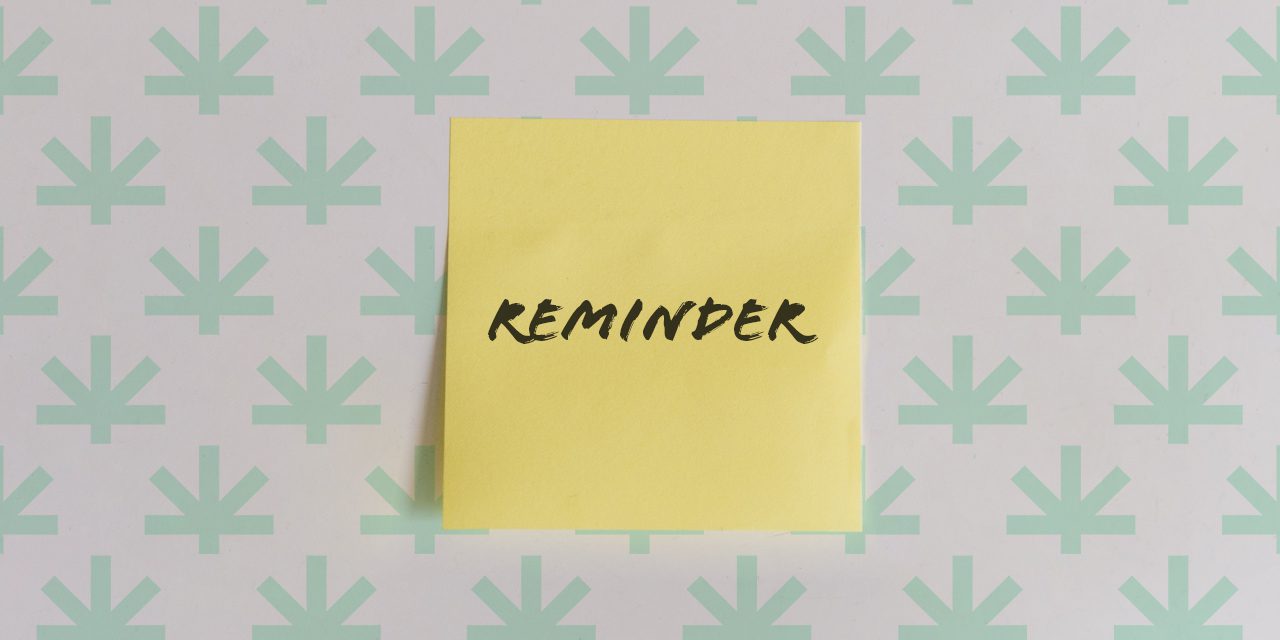 a post it sticker with a note 'REMINDER'