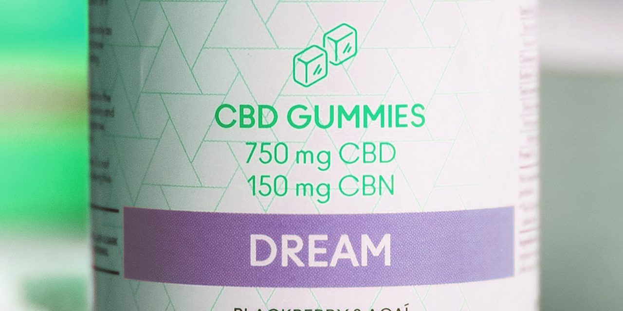 closeup of CBD gummies label on bottle