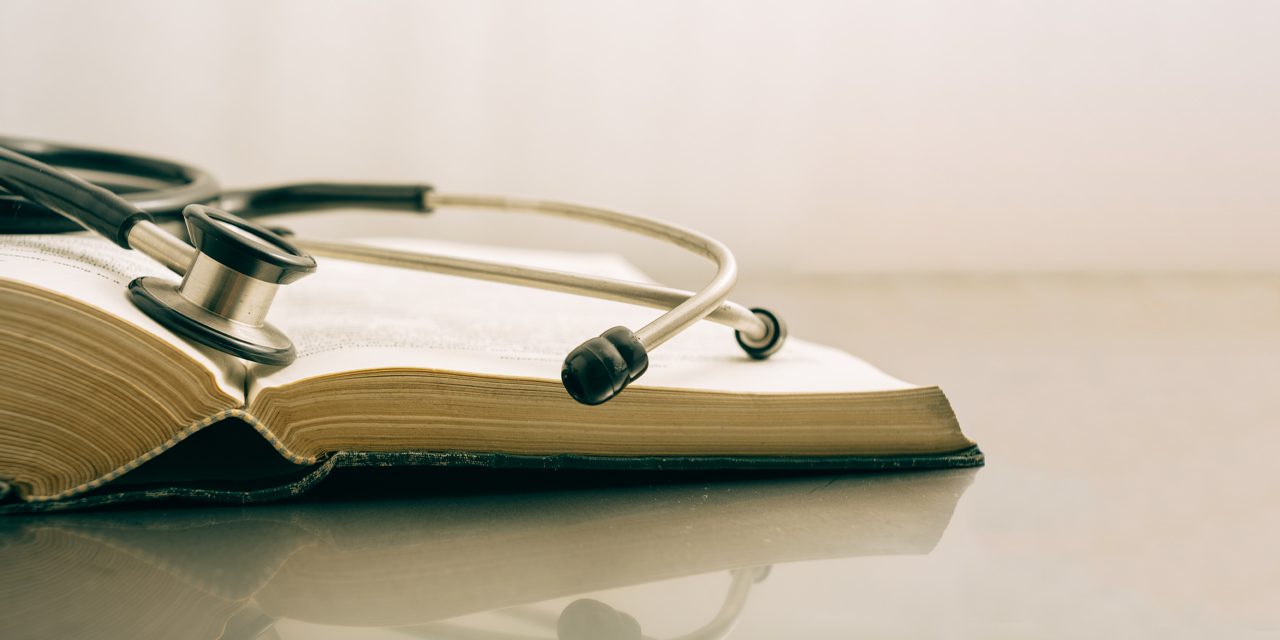 a stethoscope on a book