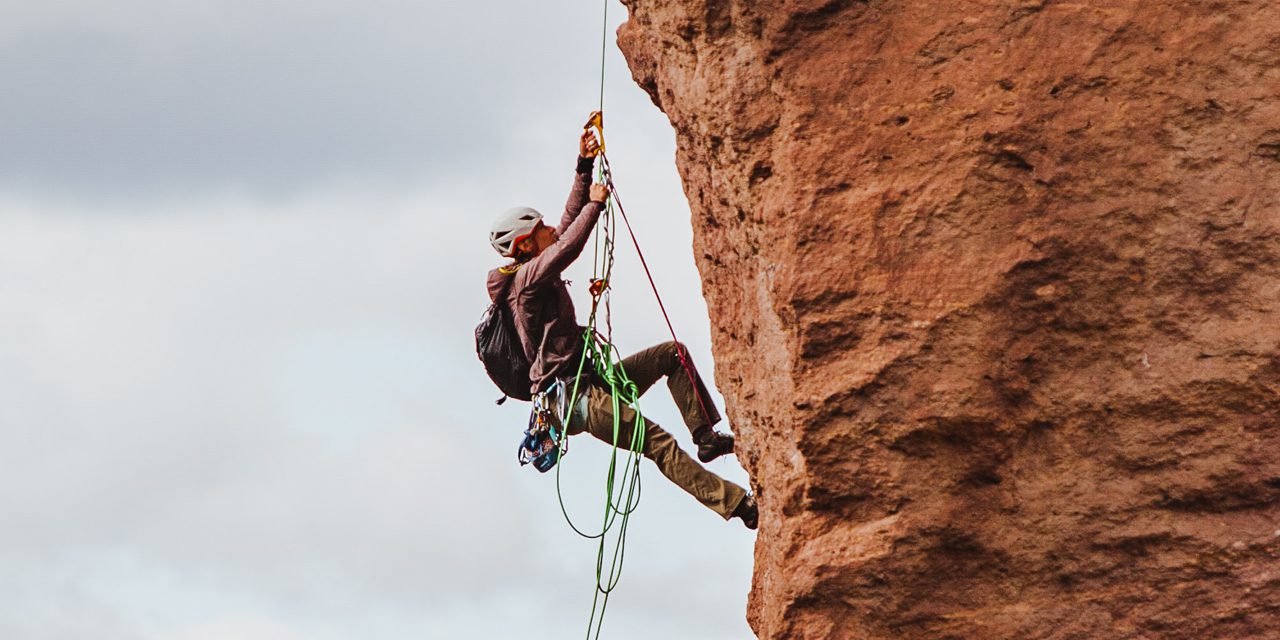man in a rock climbing